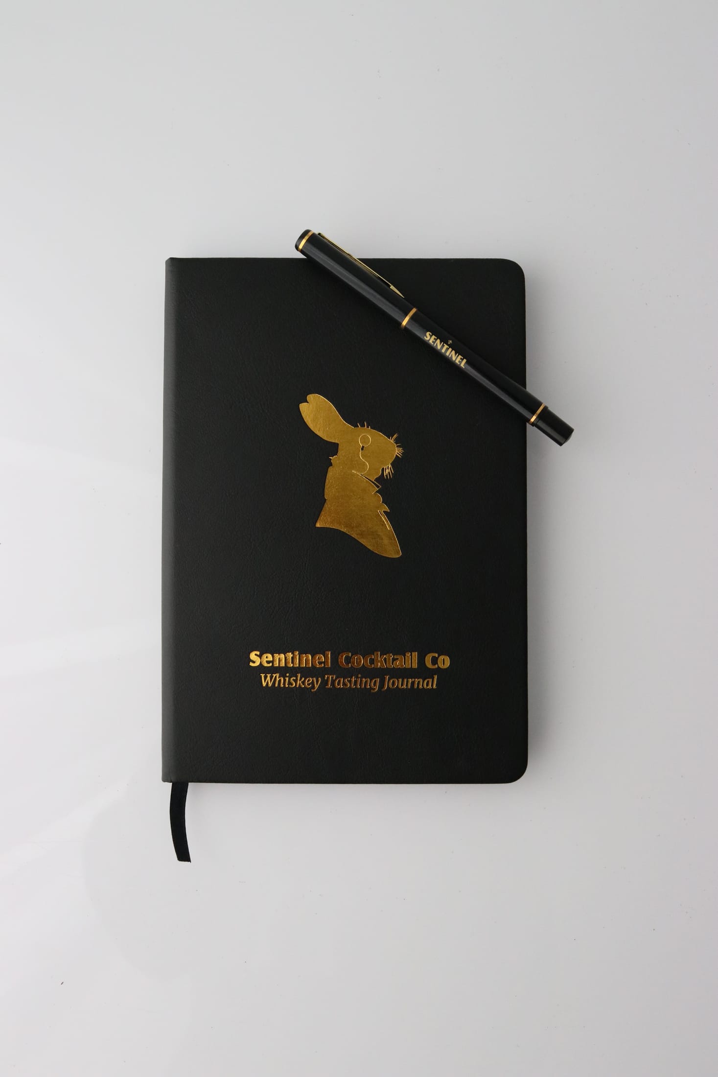 Sentinel Signature Whiskey Tasting Journal with its pen